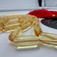 سبحة كهرمان بلطيقي شفاف قص صنوبري