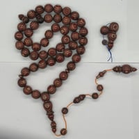 سبحة عيون من خشب الكافور