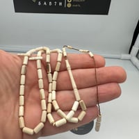 سبحة من عاج الماموث المنقرض