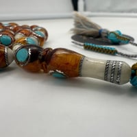 سبحة عظم جمل مطعم بالفضه 33 خرزه