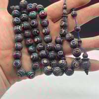 سبحة عيون من خشب الكافور