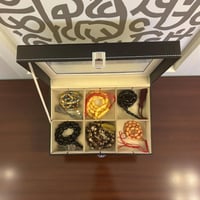 صندوق من الجلد الصناعي لحفظ السبح