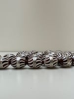 سبحة كوك ملبس بحزام من الفضه ومطعم بتراب العاج عدد...