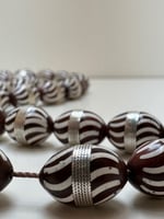 سبحة كوك ملبس بحزام من الفضه ومطعم بتراب العاج عدد...