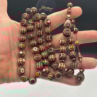 سبحة عيون من خشب الكافور