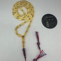 سبحة كهرمان بلطيقي شفاف 45 خرزه