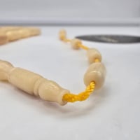 سبحة عظم نعام ملمس ناعم