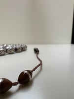 سبحة كوك ملبس بحزام من الفضه ومطعم بتراب العاج عدد...