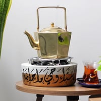 قاعدة تدفئة بتصميم ذهبي ( مخصصة بالاسم أو عبارة )