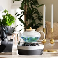 قاعدة تدفئة لون أسود