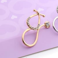 بروش سماعة ذهبية| Medical brooch