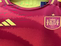 تيشيرت اسبانيا الاساسي فئة لاعبين -2025