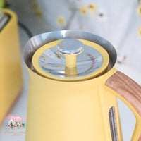 0641 غلاية مميزة بلون أصفر وخشبي