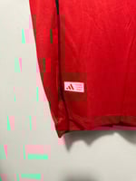 تيشيرت مان يونايتد الأساسي 2025/26