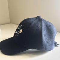 قبعة أمطر يزهر ماحولك