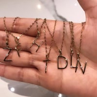 سلاسل الحروف الأنجليزية باللون الذهبي (N525) .