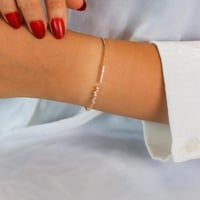 أسورة الأنيقة باللون الذهبي .(B1023)