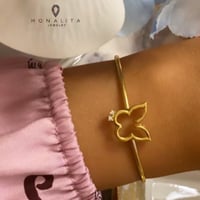 أسورة ورد أنيقة باللون الذهبي (B419) .