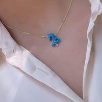 طقم أنيق مكون من قطعتين باللون الذهبي-الفيروزي (SE...