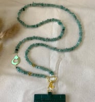 تعليقه بطاقه حجر اخضر