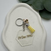 ميدالية مفتاح اكريلك مع طباعه