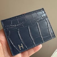 محفظة بطاقات مع طباعه حرف