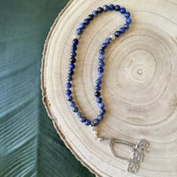 سبحه مصنوعه من خرز طبيعي