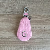 تعليقه سياره مع ( برج + حرف ) مطلي ذهب