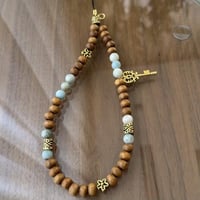 تعليقه جوال خشب وخرز طبيعي