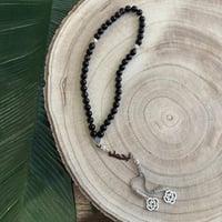 سبحه مصنوعه من خرز طبيعي