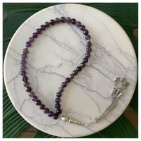 سبحه مصنوعه من خرز طبيعي