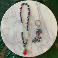 تعليقه سياره حجر ملون