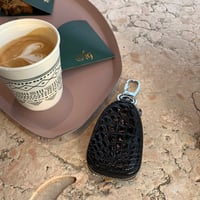 محفظة ريموت اسود