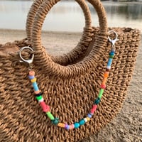 تعليقه شنطه ملونه