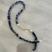 تعليقه نظاره حجر ازرق