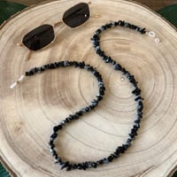 تعليقه نظاره حجر اسود ممزوج برمادي