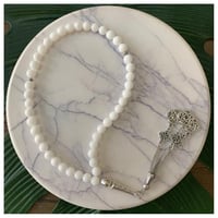 سبحه مصنوعه من خرز طبيعي