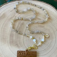 تعليقه بطاقه حجر ذهبي