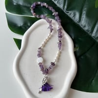 تعليقه سيارة حجر بنفسجي