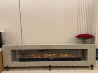 ديكور خشبي مع بديل رخام وجهاز تدفئة ثلاثي الابعاد...