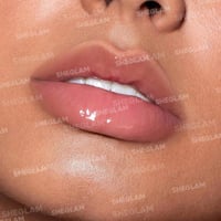 جيلي واو زيت ملمع ومرطب شفاه من شجلام - جريب فروت...