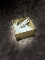 ميدلية او تعليقة بأحرف اللوحة