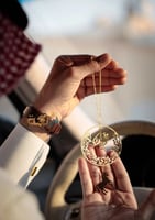 تعليقه سيارة بالاسم