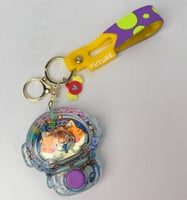 سلسلة مفاتيح ضغط الماء رائد فضاء