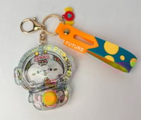 سلسلة مفاتيح ضغط الماء رائد فضاء