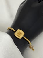 أ سوارة كهرمان ذهب (عيار21K(