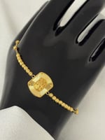 أ سوارة كهرمان ذهب (عيار21K(