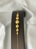 أسوارة كهرمان ذهب (عيار21K)