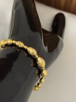 أسوارة كهرمان ذهب (عيار21K)