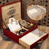بوكس إهداء نسائي بمميز يشمل شنطه راقيه مع مصحف وطق...